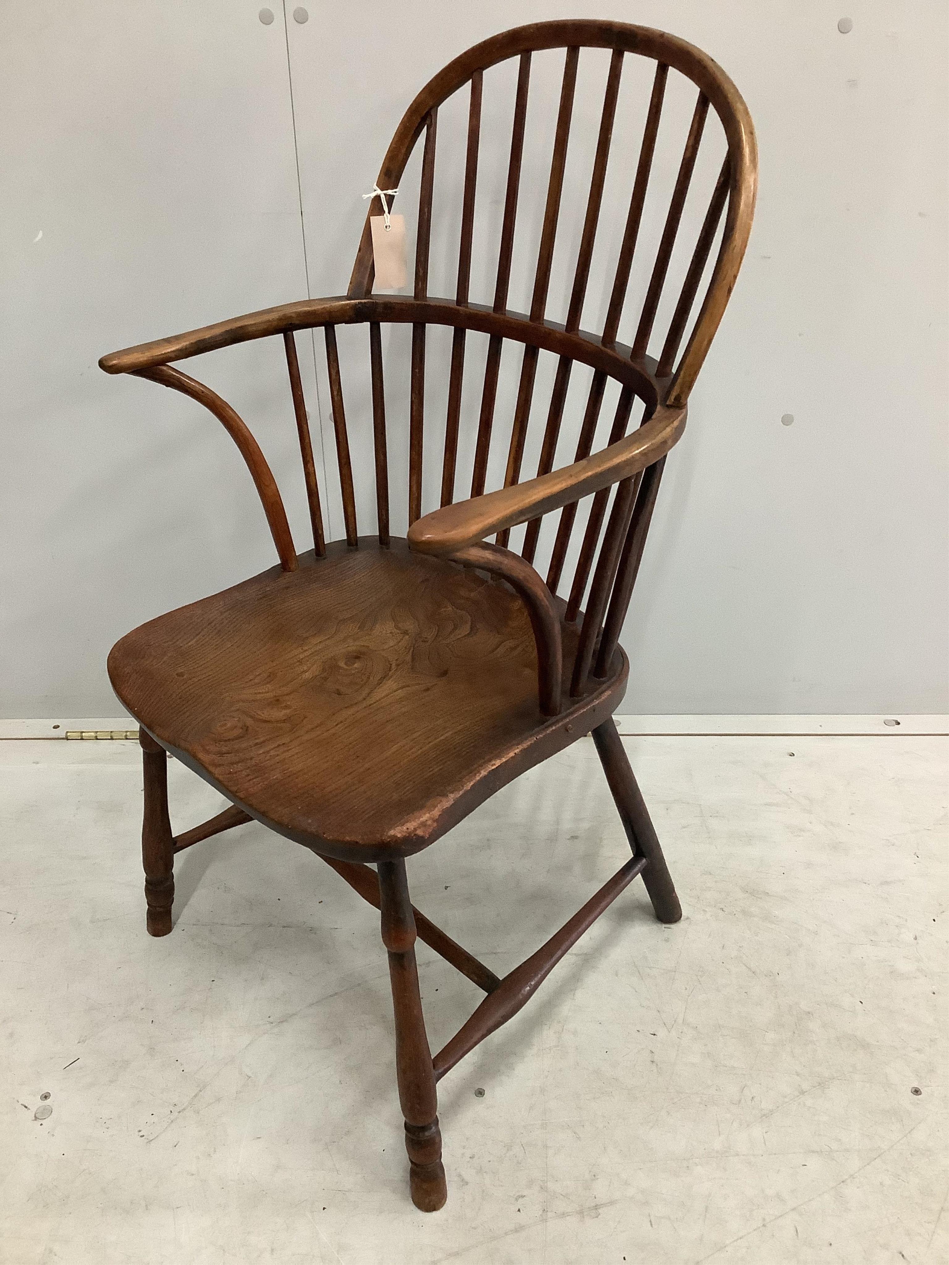 A 19th century Thames Valley elm and beech comb back Windsor elbow chair, width 49cm, depth 41cm, height 93cm. Condition - fair